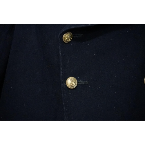 293 - A Naval issue Wide Lapelled Coat with Brass Buttons owned by 