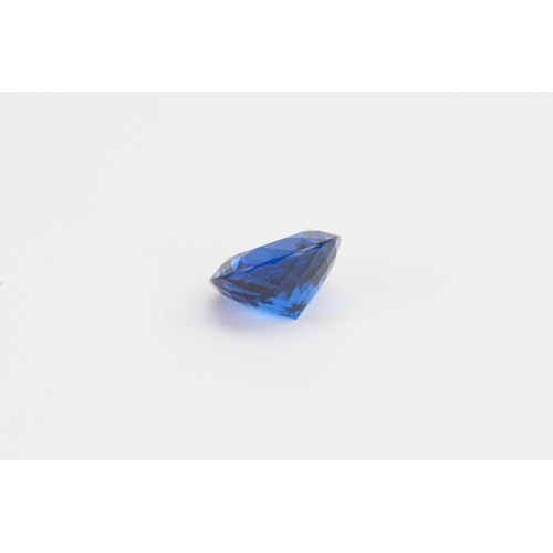 74 - A blue round cut synthetic Topaz 39.29ct. Weight 7.9g.