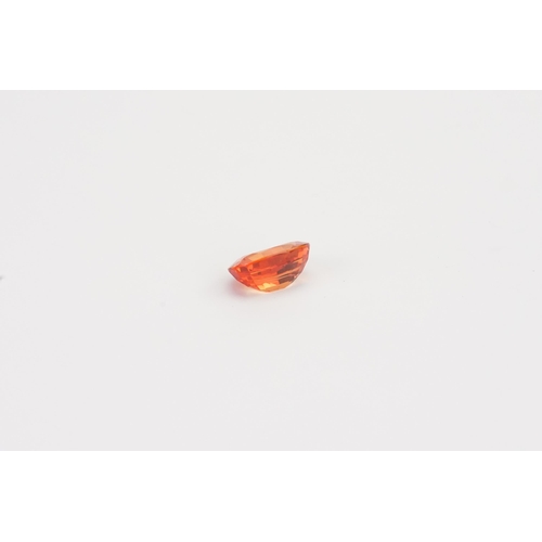 77 - An orange oval cut synthetic Sapphire 7.45ct. Weight 1.49ct.