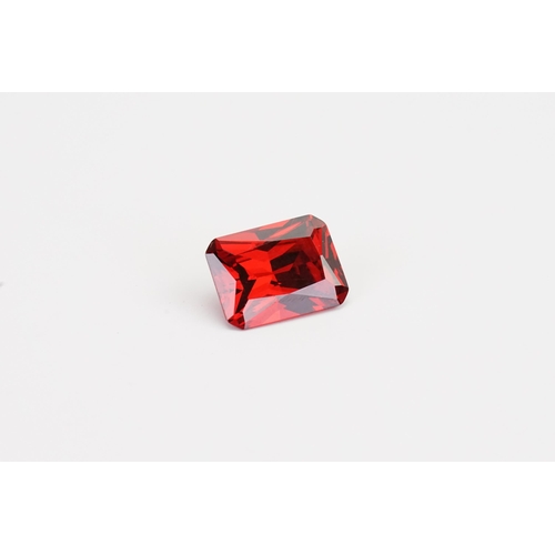 78 - A large Synthetic Emerald cut garnet. 38.4ct. Weight 7.6g.