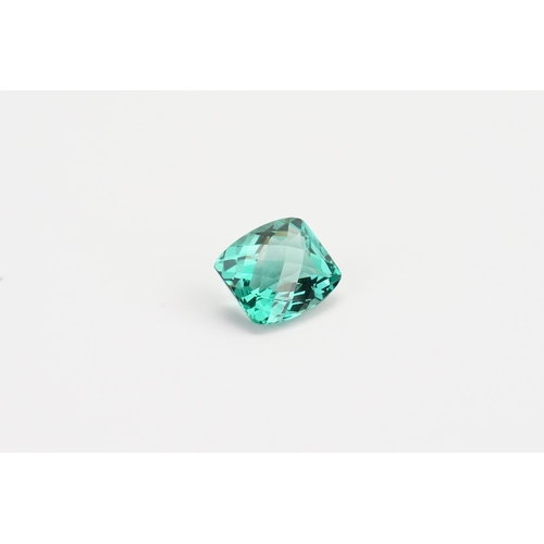 79 - A cushion cut green synthetic Amethyst 16ct. Weight 3.2g