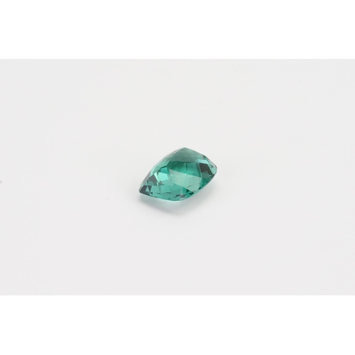 79 - A cushion cut green synthetic Amethyst 16ct. Weight 3.2g