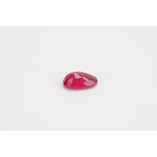 80 - A modified pear cut synthetic Ruby 14.14ct. Weight 2.83g.