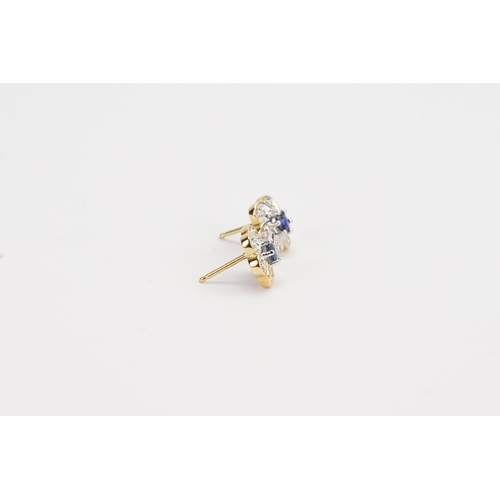 89 - A pair of Diamond and Sapphire set flower earrings. Hallmarked 0.900 Weight: 2.4g. Sapphire size app... 