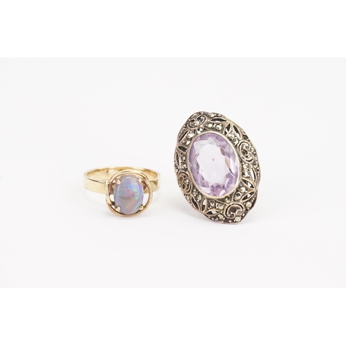 93 - A 9ct Gold Opal Set Dress Ring. Weighing: 2.9 grams. Size: N. Along with a Silver Amethyst Set Ring.... 