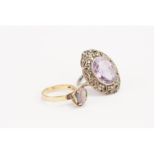 93 - A 9ct Gold Opal Set Dress Ring. Weighing: 2.9 grams. Size: N. Along with a Silver Amethyst Set Ring.... 