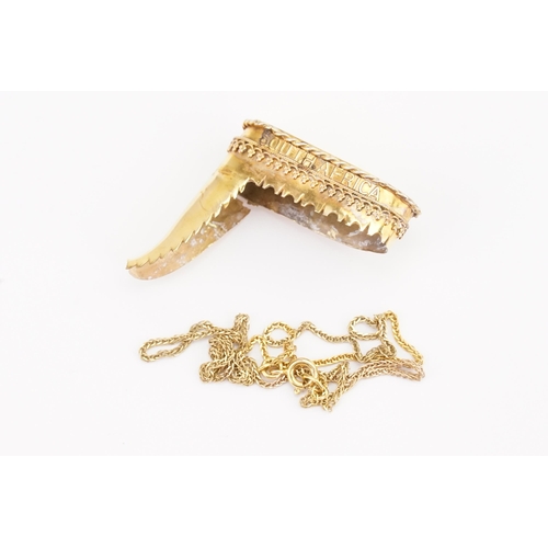 96 - A Gold Tiger Claw Mount. Weighing: 6.4 grams. Along with a 9ct Gold Chain. Weighing: 1.3 grams. (AF)... 