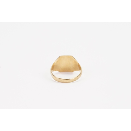 112 - A 9ct Gold engraved signet ring. Size U. Weight 4g.