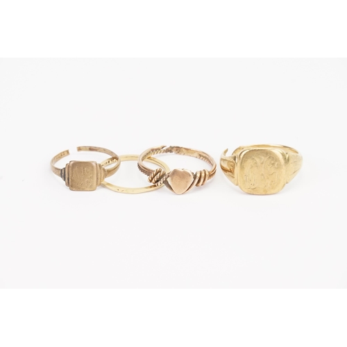 113 - A pair of 9ct Gold cut signet rings(5.9g). Along with a 15ct (0.8g)band and one other.