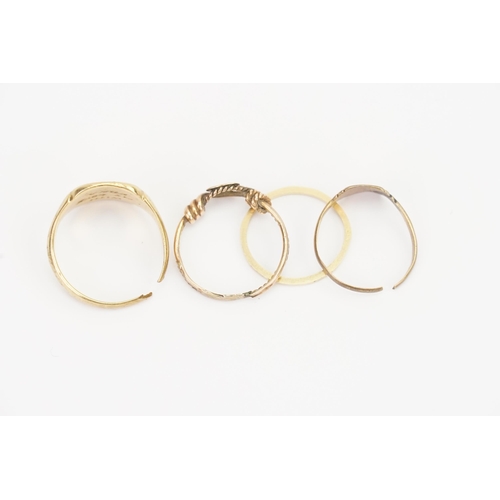 113 - A pair of 9ct Gold cut signet rings(5.9g). Along with a 15ct (0.8g)band and one other.