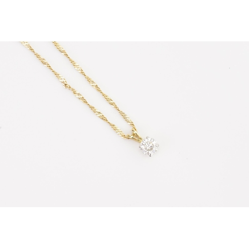 119 - A brilliant cut solitaire diamond, hung on a 9ct Gold chain. Size approx 0.6ct. Total weight 2.5g.