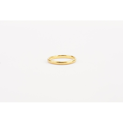 120 - A 22ct Gold wedding band. Size L. Weight 2.4g.