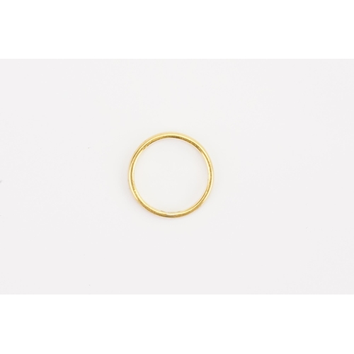 120 - A 22ct Gold wedding band. Size L. Weight 2.4g.