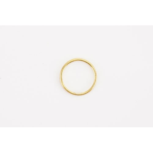 120 - A 22ct Gold wedding band. Size L. Weight 2.4g.