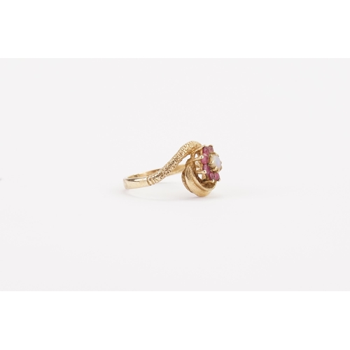 121 - A 9ct Gold ring, set with an Opal doublet & pink stones. Size M. Weight 3.3g.