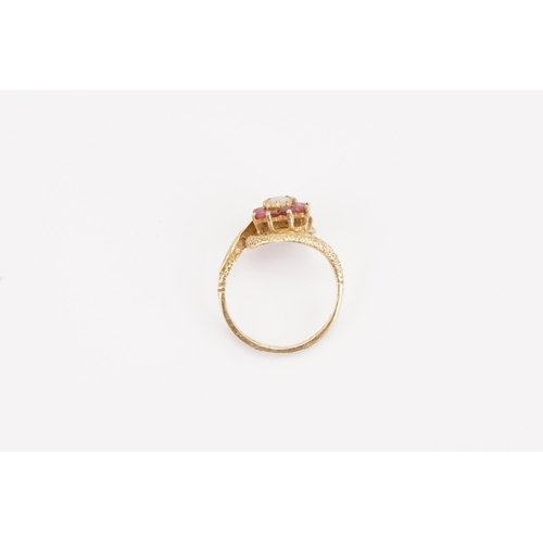 121 - A 9ct Gold ring, set with an Opal doublet & pink stones. Size M. Weight 3.3g.