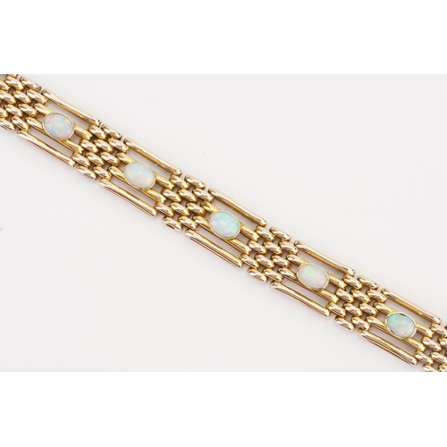 124 - A 15ct Gold gate bracelet set with 10 Opals. Length 18cm. Weight 18.6g.