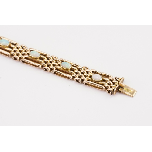 124 - A 15ct Gold gate bracelet set with 10 Opals. Length 18cm. Weight 18.6g.