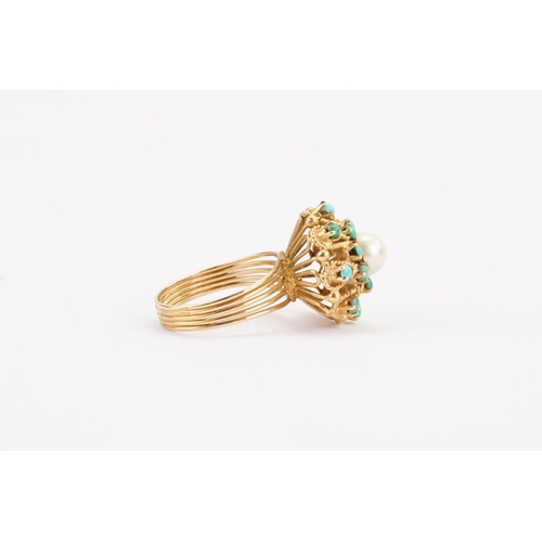 130 - A 9ct Gold Portuguese turquoise and pearl set ring, in a raised setting. Size P. Weight 6.6g.