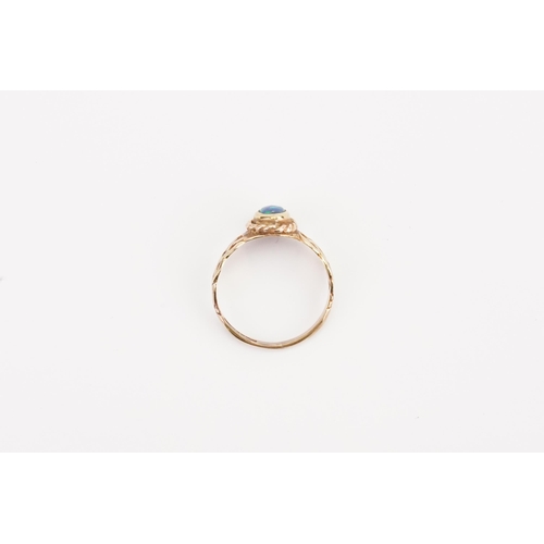 134 - A 9ct Gold Opal set ring. Size P. Weight 2.4g.