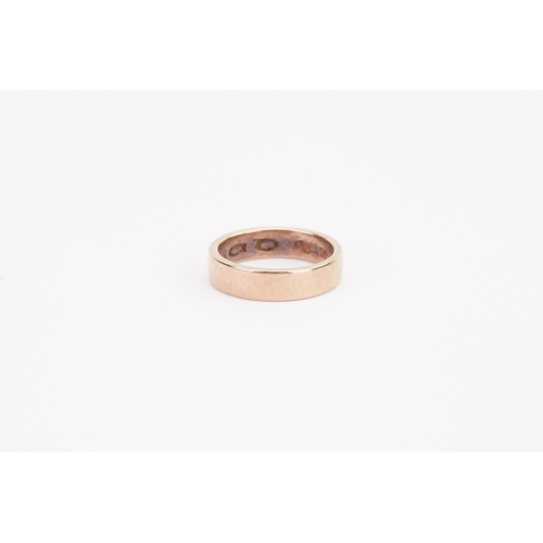 136 - A 9ct rose Gold Clogau band. Weight 5.7g. Size Q.