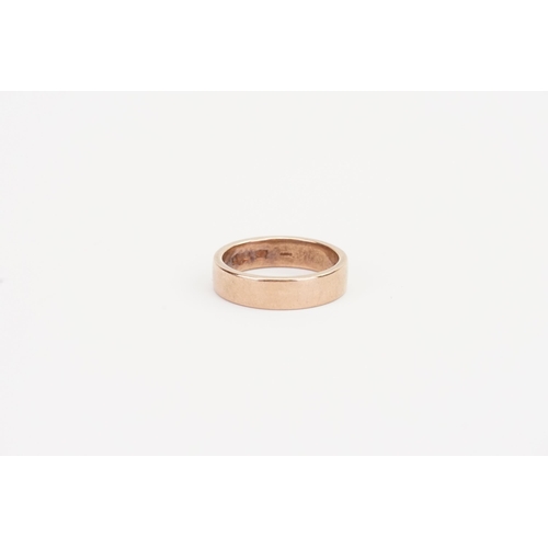 136 - A 9ct rose Gold Clogau band. Weight 5.7g. Size Q.