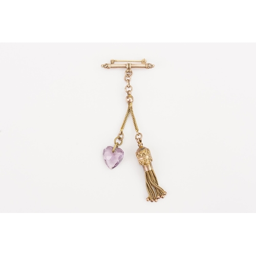 138 - A Gold coloured Amethyst heart set brooch, hung with tassel decoration, along with a diamond set cli... 