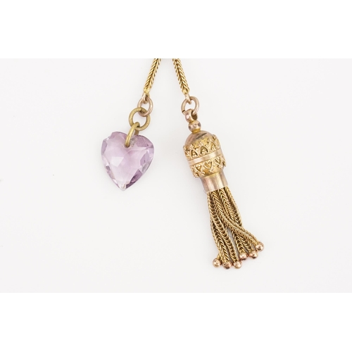 138 - A Gold coloured Amethyst heart set brooch, hung with tassel decoration, along with a diamond set cli... 