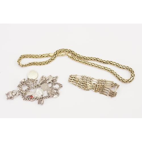 172 - A Silver Gold gilt necklace, along with a Silver charm bracelet and one unmarked.