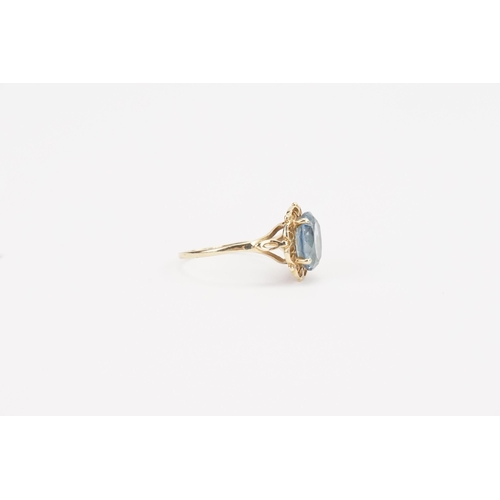 144 - A 9ct Gold blue stone set ring. Stone size approx 10mm x 7.9mm. Ring size N. Weight 2.1g.