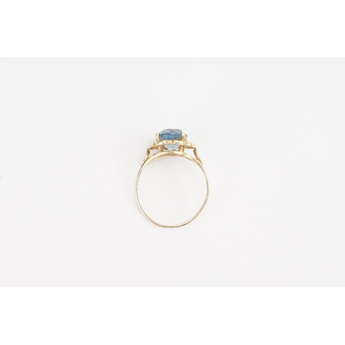 144 - A 9ct Gold blue stone set ring. Stone size approx 10mm x 7.9mm. Ring size N. Weight 2.1g.