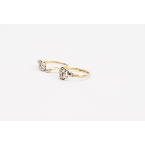 157 - A pair of 18ct Gold old cut diamond rings, in the floral design. Weight 3.7g.