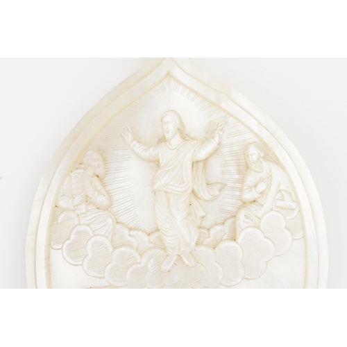 161 - A Late 19th Century Carved Mother of Pearl Devotional Pendent depicting the Resurrection Christ & Di... 