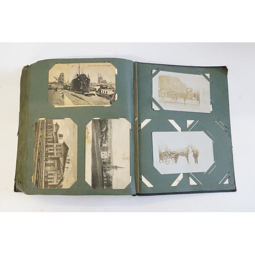 704 - An Album containing a selection of Post Cards & Silks to include a Biplane, River Scenes, Koln, Chro... 