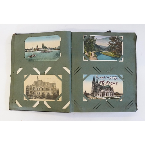 704 - An Album containing a selection of Post Cards & Silks to include a Biplane, River Scenes, Koln, Chro... 