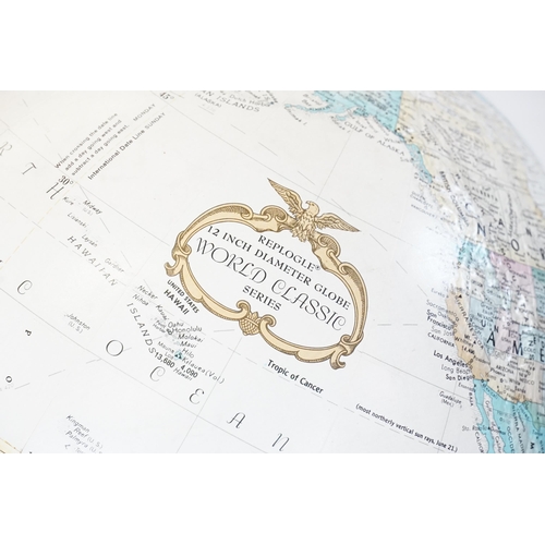 680 - A modern Paper covered Globe by 