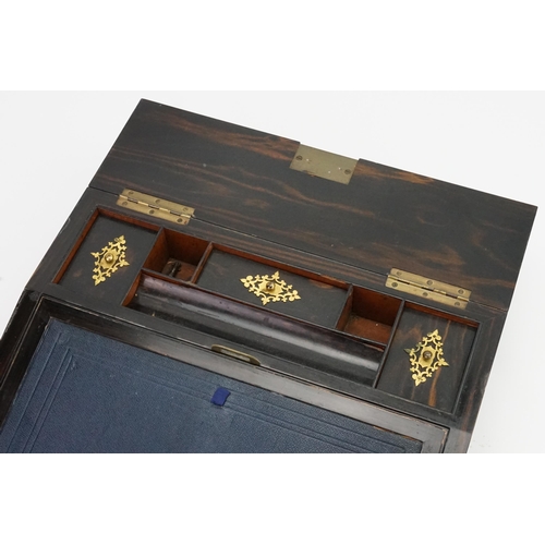 589 - A Victorian Gilt Brass & Coromandel veneered Writing Slope with a Fold Over Top, fitted interior, et... 