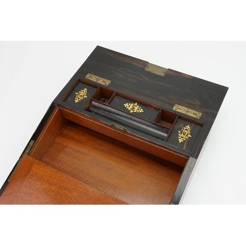 589 - A Victorian Gilt Brass & Coromandel veneered Writing Slope with a Fold Over Top, fitted interior, et... 