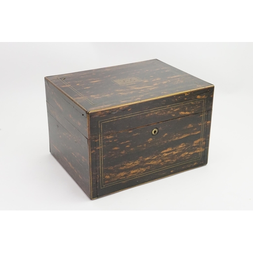 590 - A Ladies Victorian Coromandel Wood Travelling Toilet Box with a fitted interior, glass bottles & fit... 