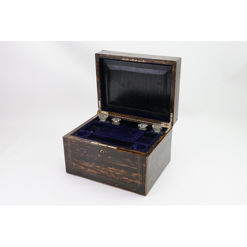 590 - A Ladies Victorian Coromandel Wood Travelling Toilet Box with a fitted interior, glass bottles & fit... 