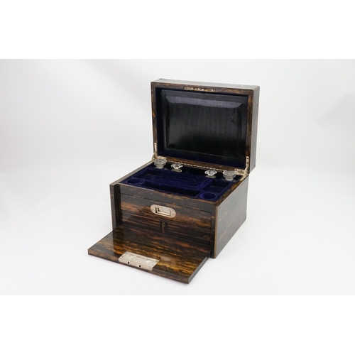 590 - A Ladies Victorian Coromandel Wood Travelling Toilet Box with a fitted interior, glass bottles & fit... 