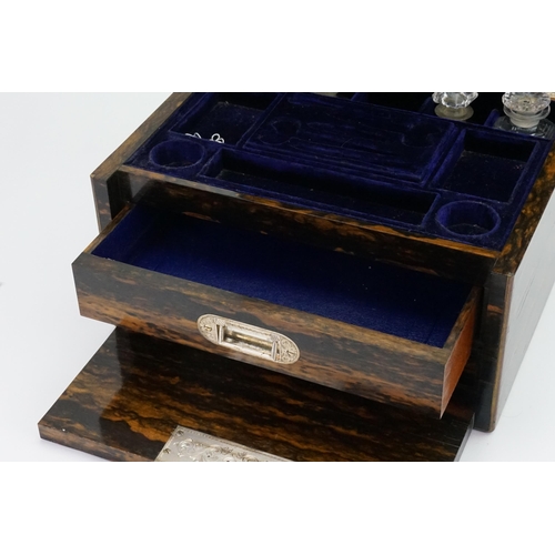 590 - A Ladies Victorian Coromandel Wood Travelling Toilet Box with a fitted interior, glass bottles & fit... 