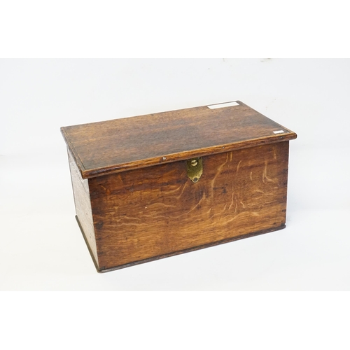 594 - An Edwardian Oak Rent Box with a Push Button Front. Measuring: 45cms long x 26cms deep x 24cms high.