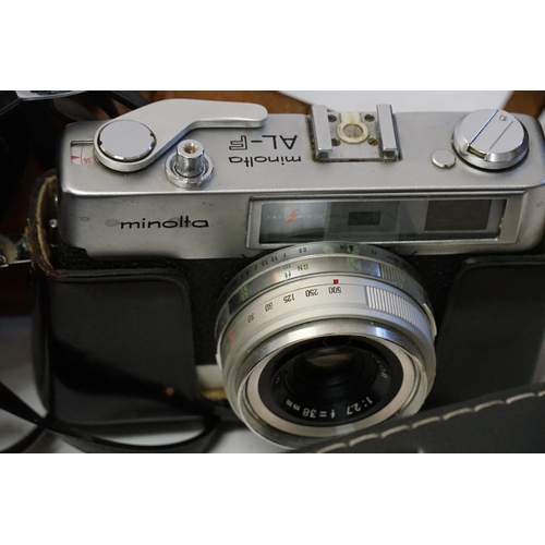 857 - A Zenith B with an elongated Lens (100ft-230/180) with a Point 22 to 45, Tripod, a Minolta Camera, a... 