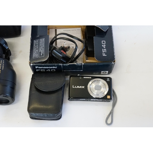 858 - A Panasonic Lumix FS40 Camera & a Pair of Nikon Action Binoculars 715/35, Both Boxed.