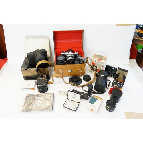 861 - A Collection of Cameras to include an Olympus OM1 with a 50mm 1.8 Lens, a Power Winder, OM System Ha... 