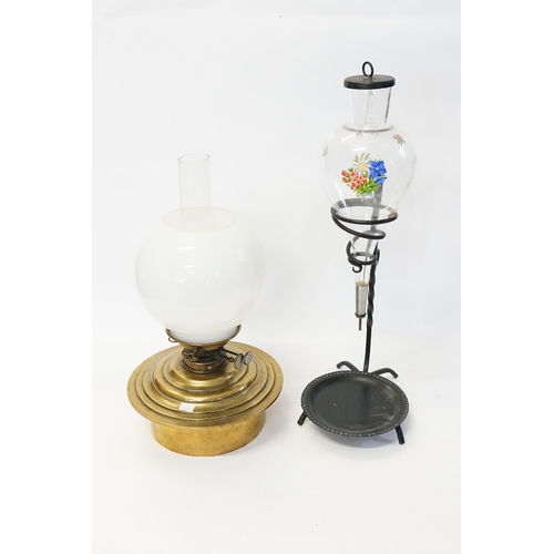 645 - A German Glass & Iron Wine Pourer & a Brass Oil Lamp with an Opalescent Shade.