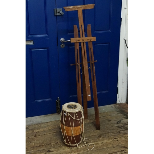 630 - An African Parchment Trible Drum & a Folding Easel.