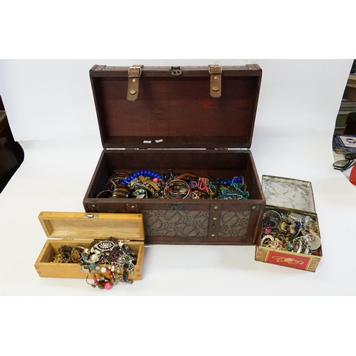 173 - A Leather Bound Travelling Trunk containing of Costume Jewellery to include 1960s Earrings, Bangles,... 