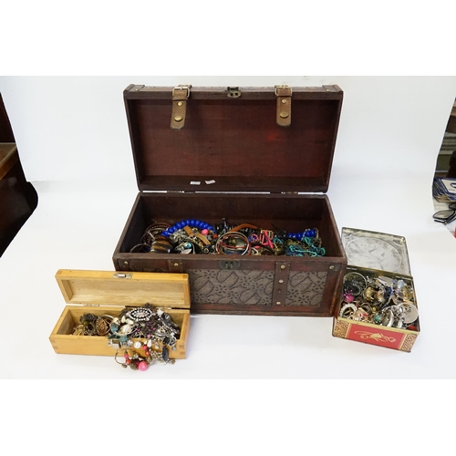 173 - A Leather Bound Travelling Trunk containing of Costume Jewellery to include 1960s Earrings, Bangles,... 